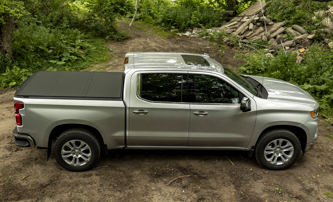 ACI B1040069 Lomax Hard Tri-Fold Tonneau Cover Matte Black | 2019-2022 Dodge Ram 2500/3500 6.5ft Bed