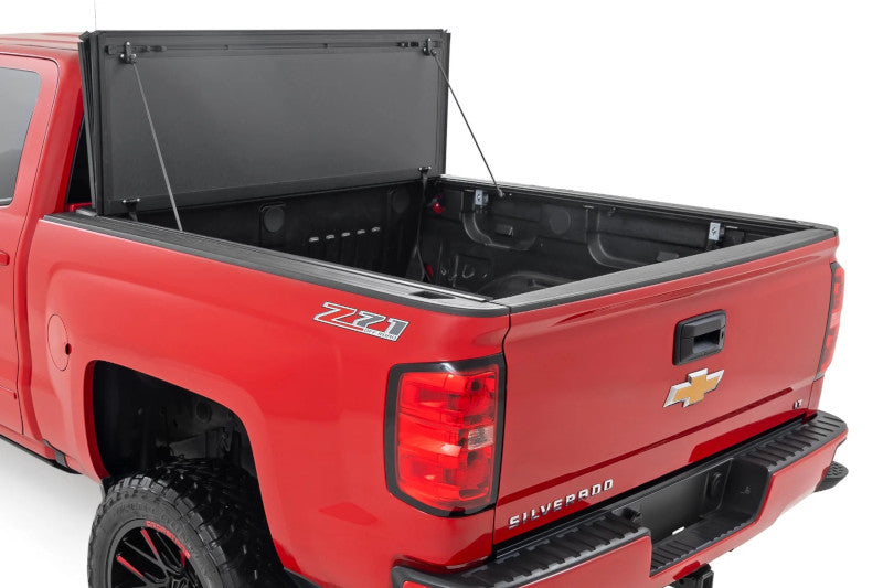 Rough Country 49119551 Hard Tri-Fold Flip Up Bed Cover | 2014-2019 Silverado/Sierra 2500HD/3500HD 5.8ft Bed