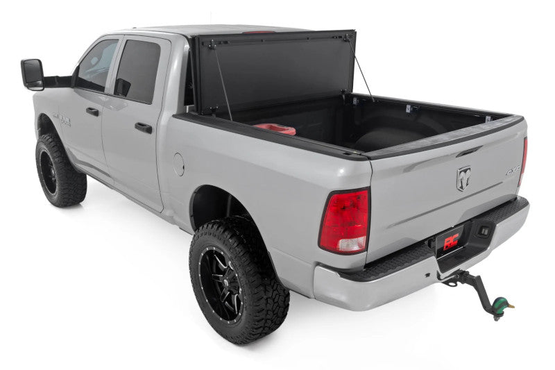 Rough Country 49318650 Hard Tri-Fold Flip Up Bed Cover | 2010-2024 Ram 2500 6.5ft Bed